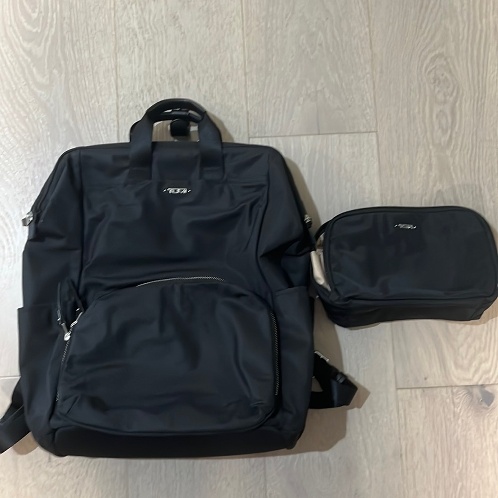 Tumi Black nylon with silver hardware backpack and pouch Perfect Diaper bag